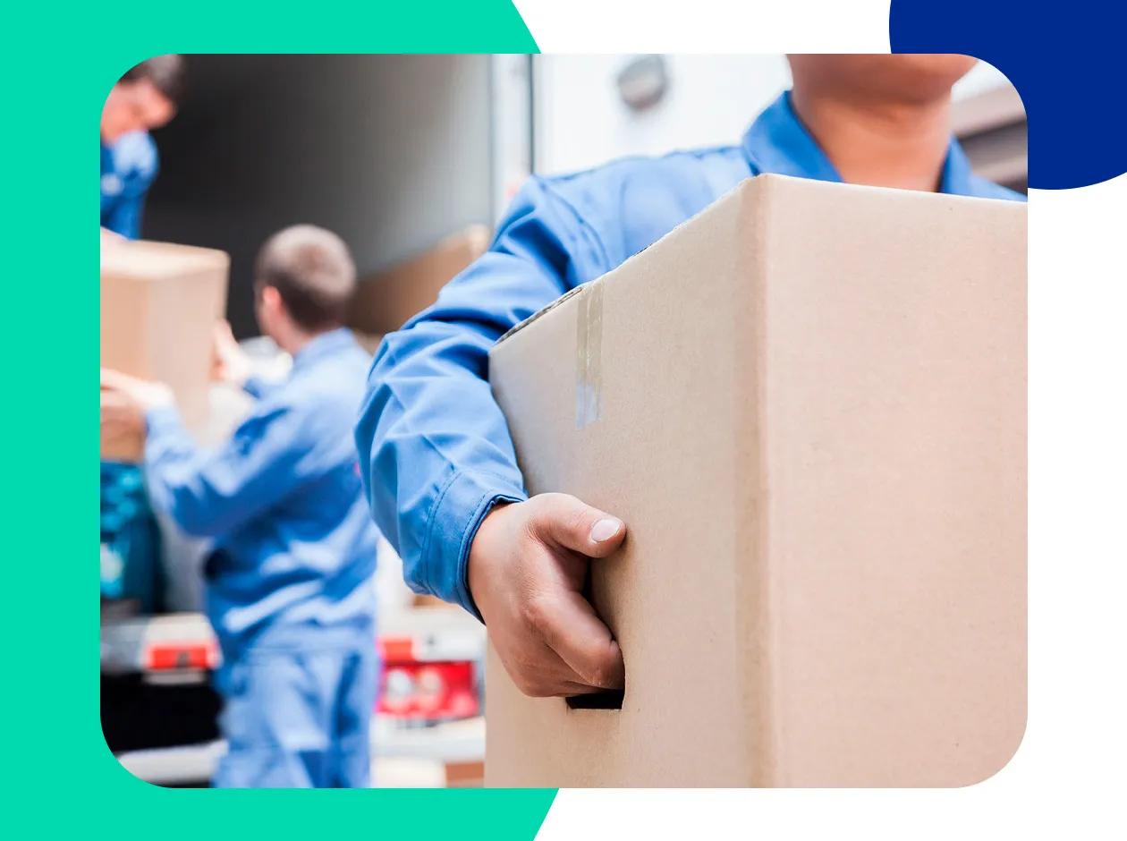 Movers loading a truck at an apartment building in Dubai Silicon Oasis